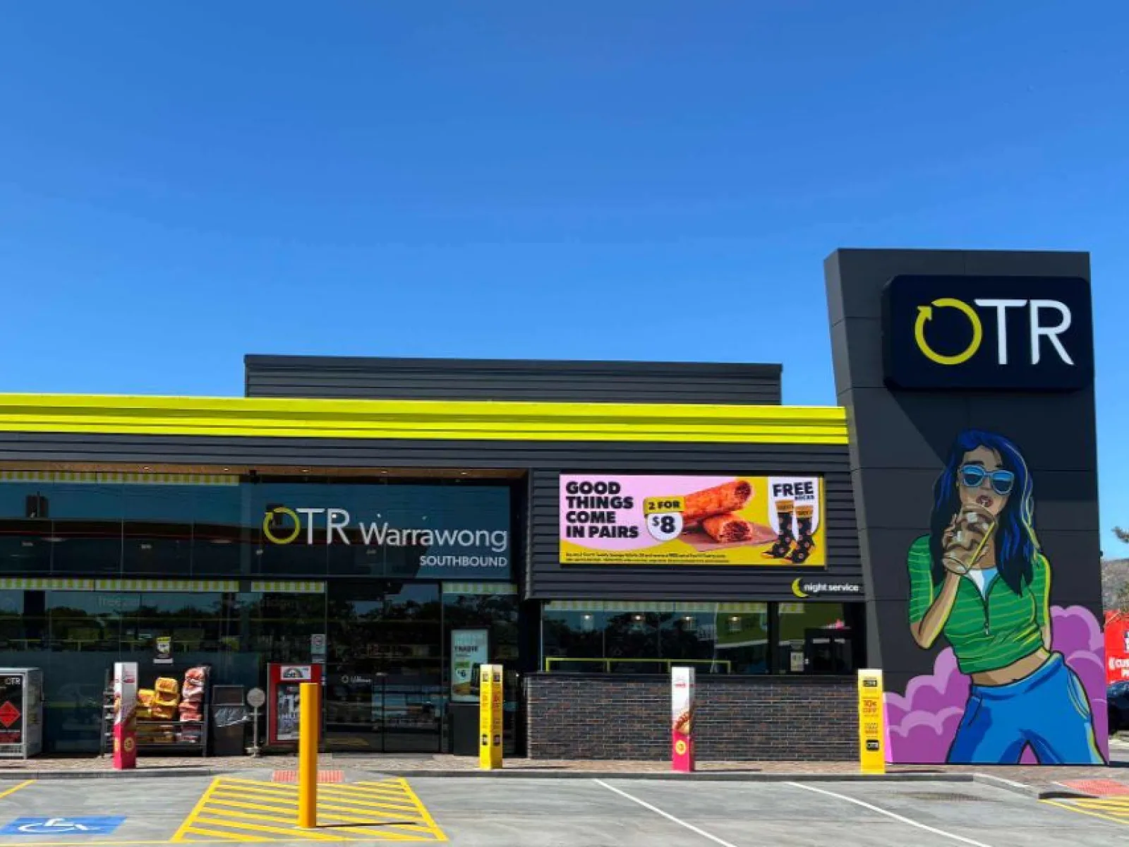 The OTR Warrawong store front, with a promotion on the digital screen above the windows
