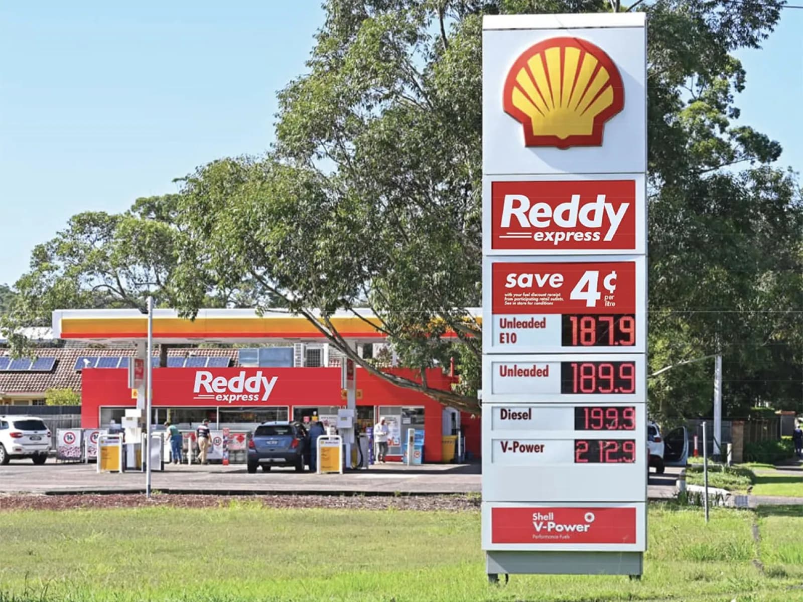 A Shell price sign carrying the Reddy Express brand, in front of the store