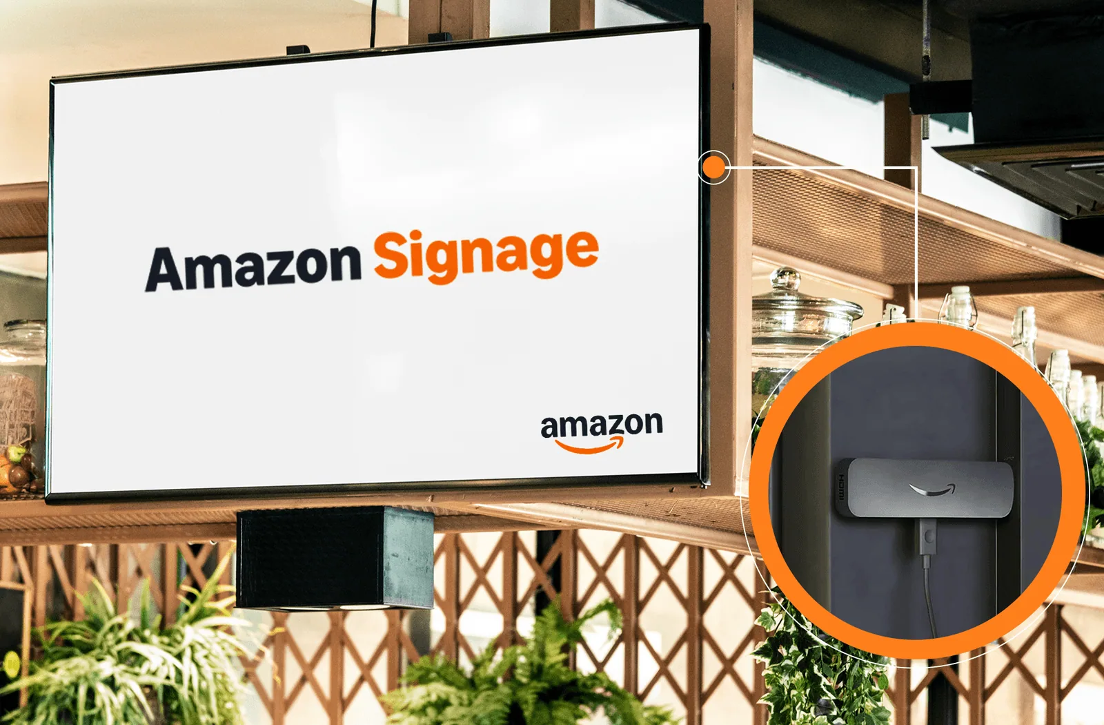 The Amazon Signage Stick plugged into a display running signage content